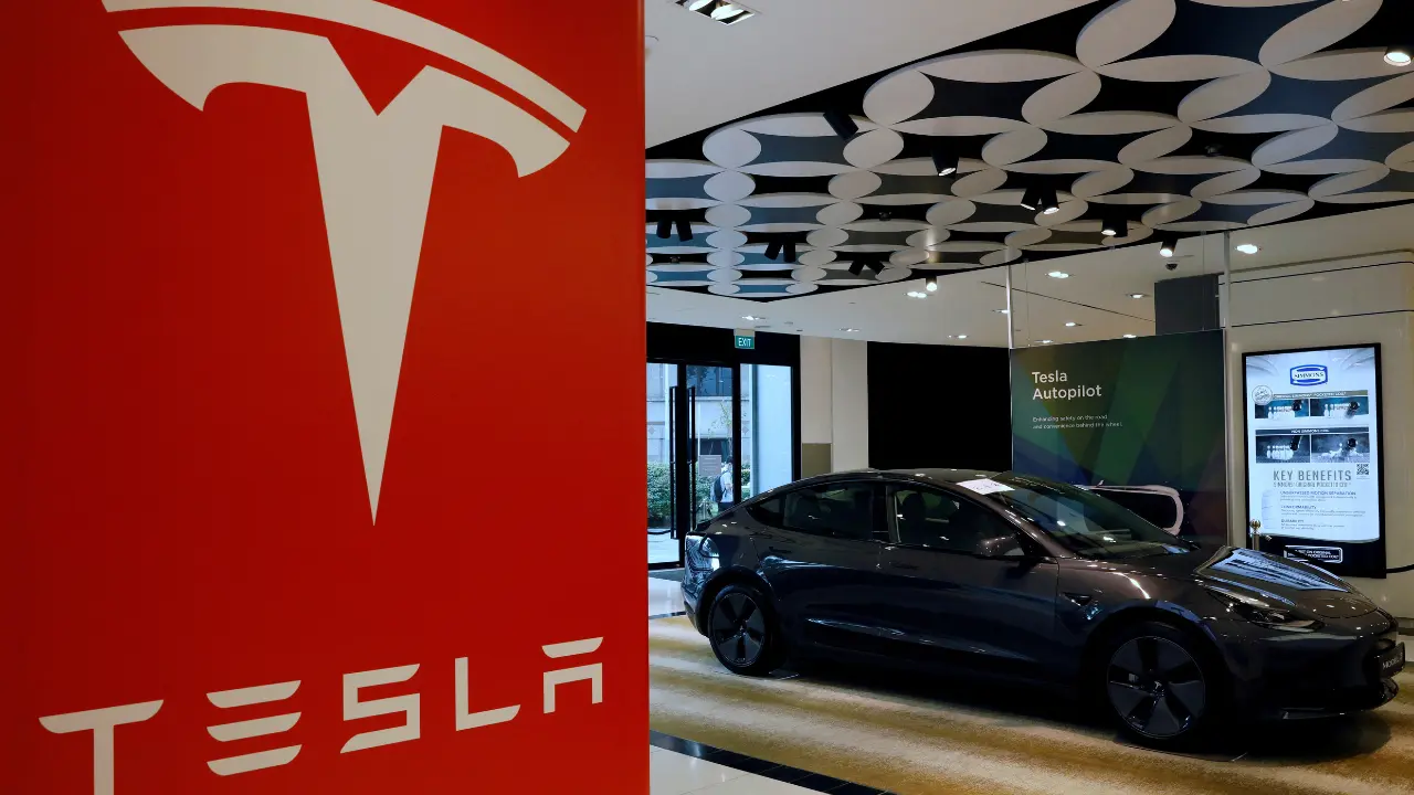 How much will the rent for a Tesla car showroom be?